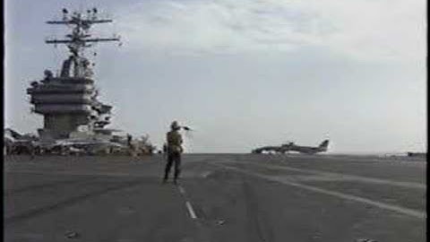 Gulf War 1991.  A F-14 Tomcat landing on Carrier