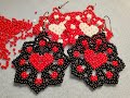 Aretes de flor con corazon en chaquiras