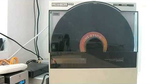 Technics SL 7 turntable played vertically