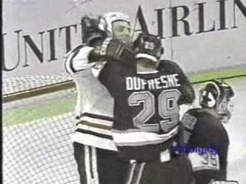 Dufresne crosschecks Sutter's neck 4/10/94