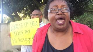 Employees Stand Outside Uga Arch To Protest