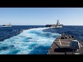 The aircraft carriers USS John C. Stennis and USS Ronald Reagan conduct strike group operations