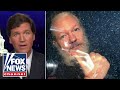 Tucker investigates why 'DOJ is pursuing Julian Assange aggressively'