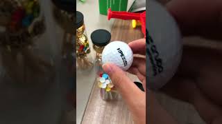 A nice packaging for golf balls and tees.