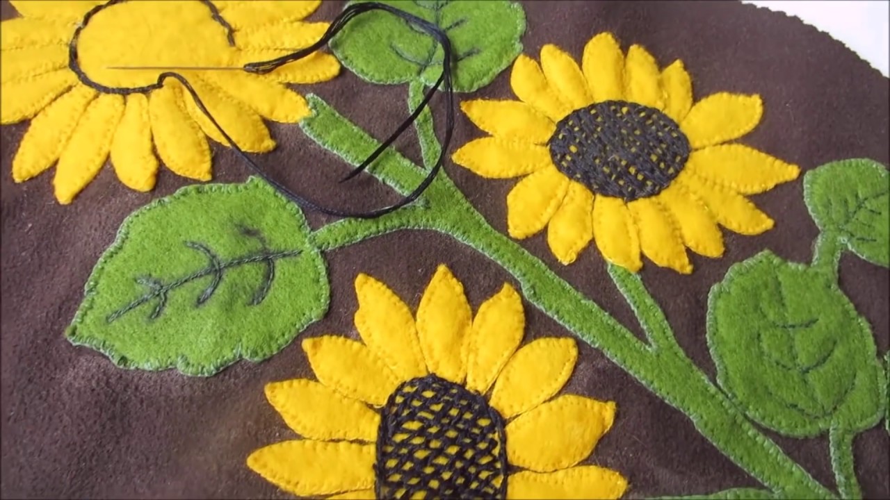 Видео: Учимся вышивать лентами цветок подсолнуха