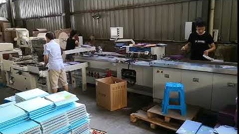 working video of automatic paper punching and binding machine
