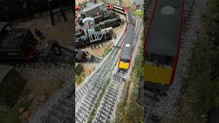 DVT 82229 passes over a Peco Streamlined Points crossover.