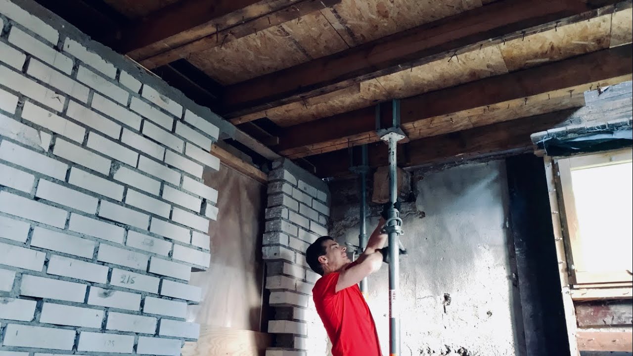 Renovation: Acrow props installed.