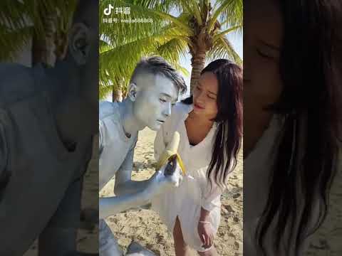 Hot Asian Girl Eating A Banana From A Statue Man's Hand | Viral Douyin(抖音)