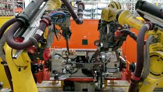 Spot welding with two FANUC robots
