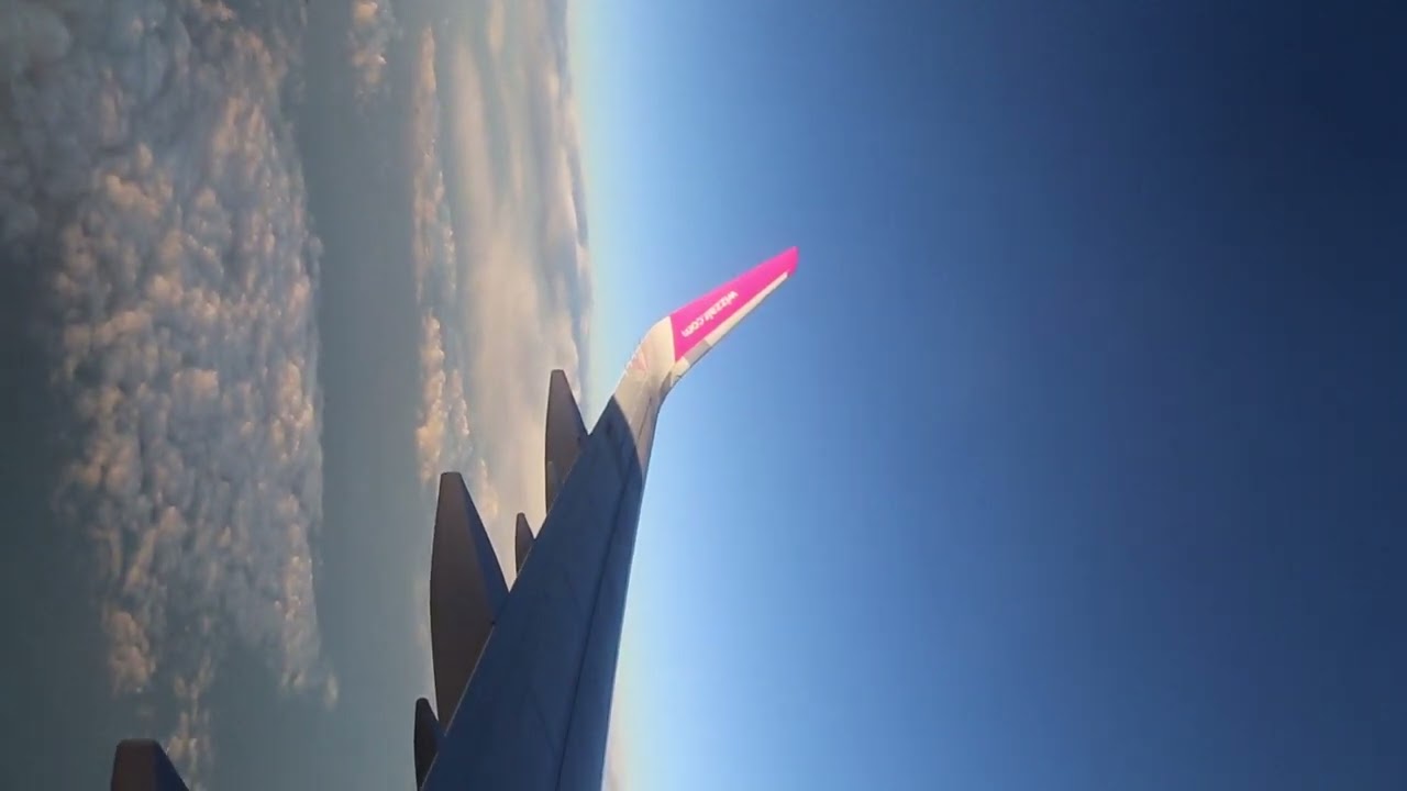 flying on a Wizz Air plane, Italy, travel Europe, 2023