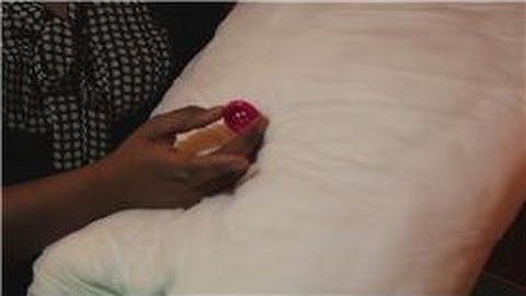 Sewing Help : How to Sew a Button on a Throw Pillow