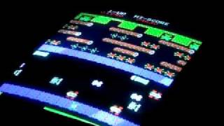 Frogger in play Game on Retro Arcade Machine