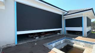 Combo hurricane shutter and screens