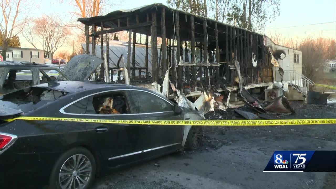 Fire destroys mobile home and vehicles - YouTube