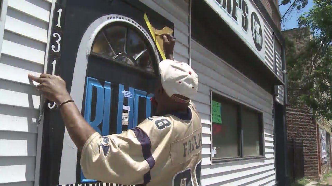 Artists, residents in Old North St. Louis take to painting doors to spread joy and peace