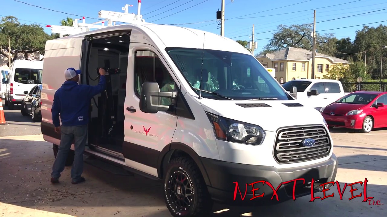 Customized At Next Level Inc. Construction Unlimited Work Van With WEATHER GUARD Roof Rack