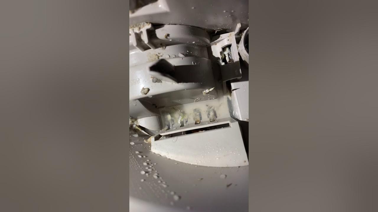 Unclogging a Dishwasher Part II 2of2 Removing debris under the