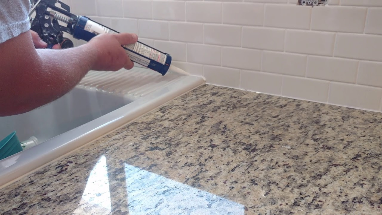 How to install silicone caulk around kitchen countertop shower bath tub etc