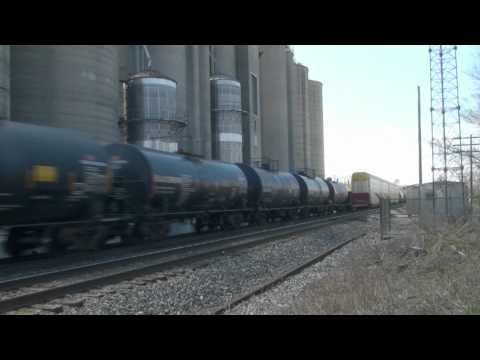 April 17, 2011, I Was Video Recording BNSF Train 935 As It Was Leaving Hicksville, Ohio. Then A CSX Went Striking Past So Fast I Couldn't Catch The Train Number. Let's Go High Speed Trains!