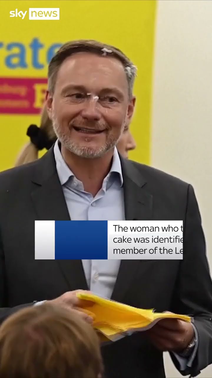 Politician slapped with cake in face