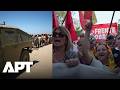 Protesters Rally Outside Moroccan Embassy in Madrid Over Ceuta Migration Surge | APT
