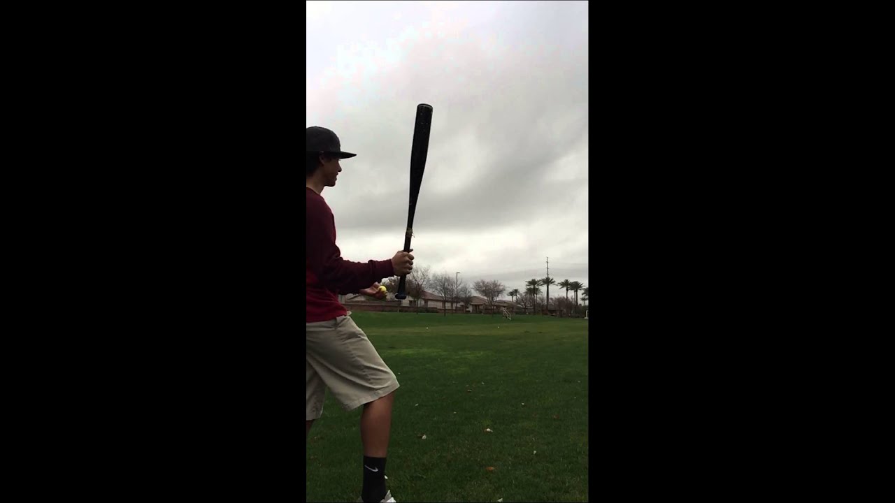 Baseball player hits golf ball with a bat YouTube