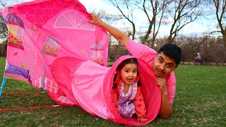 Arya and her Dad pretend play in her pink house