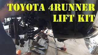 In this video we're working on brandon's 2005 4runner again. he had
the oem struts with 2.5 inch spacers and wants to upgrade a longer
strut remove...