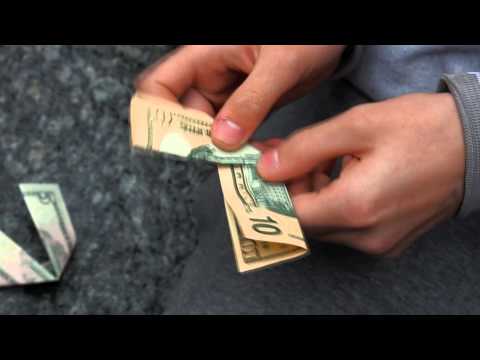Vidéo: Les billets de 5 dollars ont-ils des bandes ?
