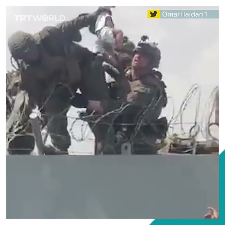 Afghans hand baby over to US troops at Kabul airport