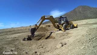 CAT 446B Backhoe Digging