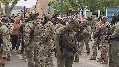 ICE agents clash with Chicago residents