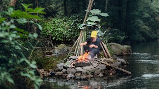 Girl camping alone in the forest and cooking for survival