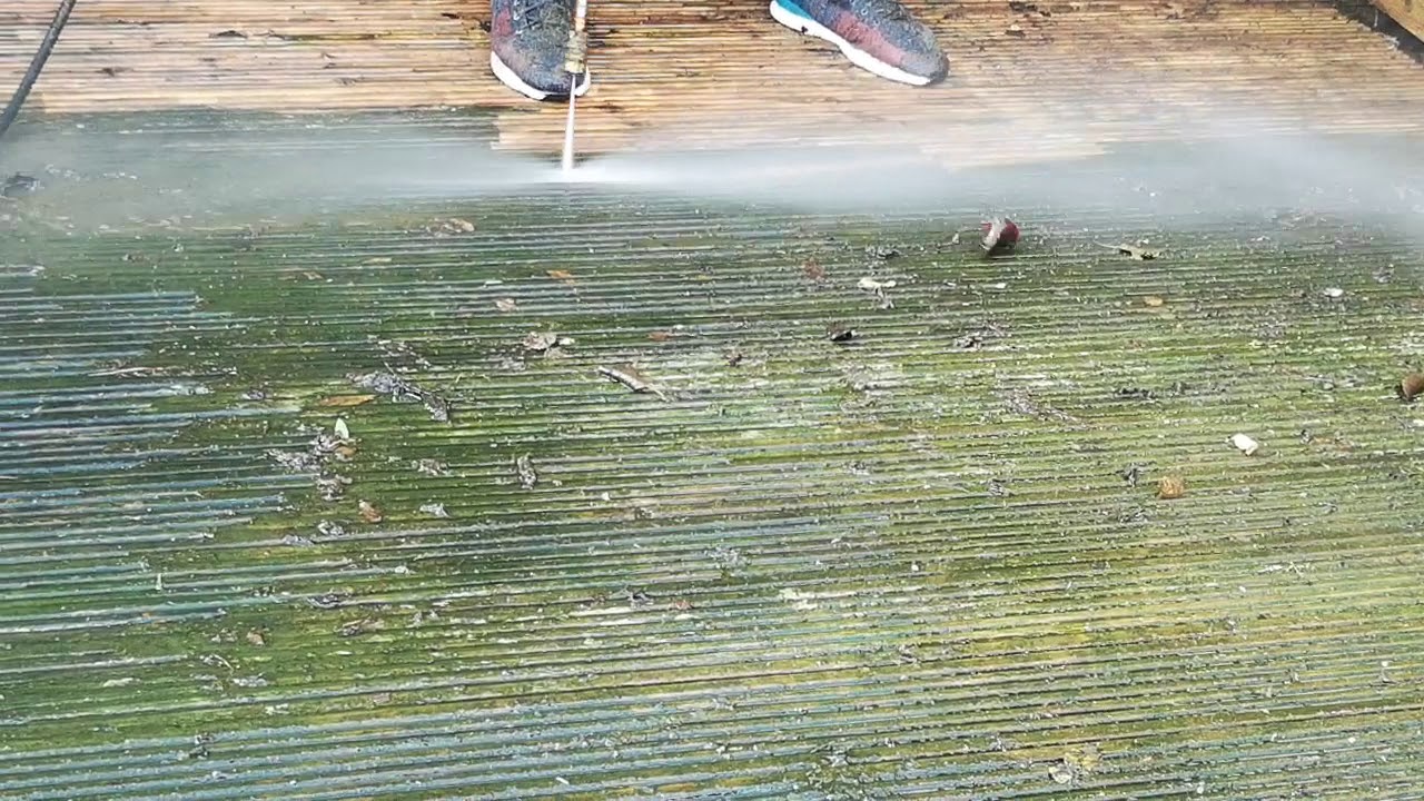 Pressure washing slippery decking in Okehampton. Www.hotwashwindowcleaners.co.uk