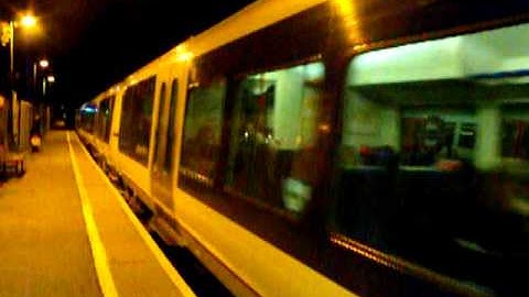 A Chiltern Railways Class 165 departs Chalfont & Latimer