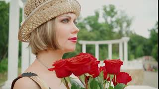 Video Background Stock Footage Free ( Girl in a hat with  bouquet of roses )