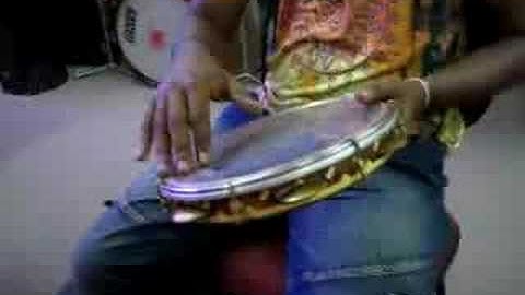 aprende a tocar pandero samba