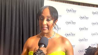 Tamera Mowry-Housley (Host) on 2024 Gracie Awards red carpet