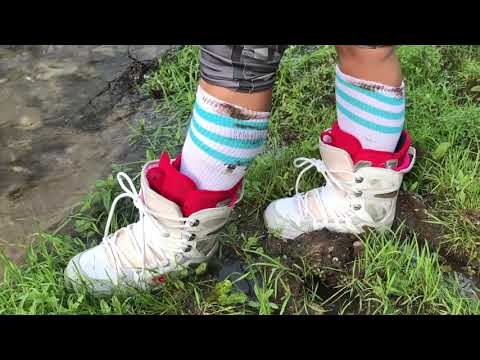 Kate's muddy DC snowboard boots + socks