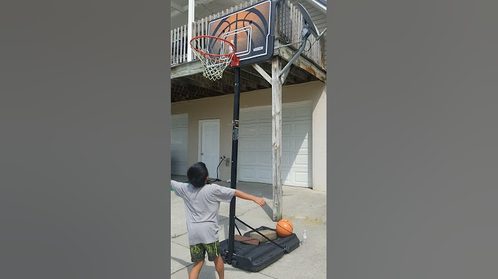 Bottle flip on the basketball goal