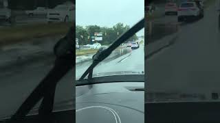 VEHICLE BROKE DOWN AND TRAFFIC BACKED UP FOR MILES ON THIS RAINY DAY