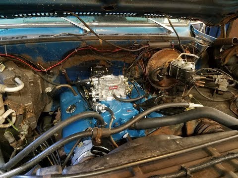 Video: Hoe installeer je een carburateur op een Chevy 350?