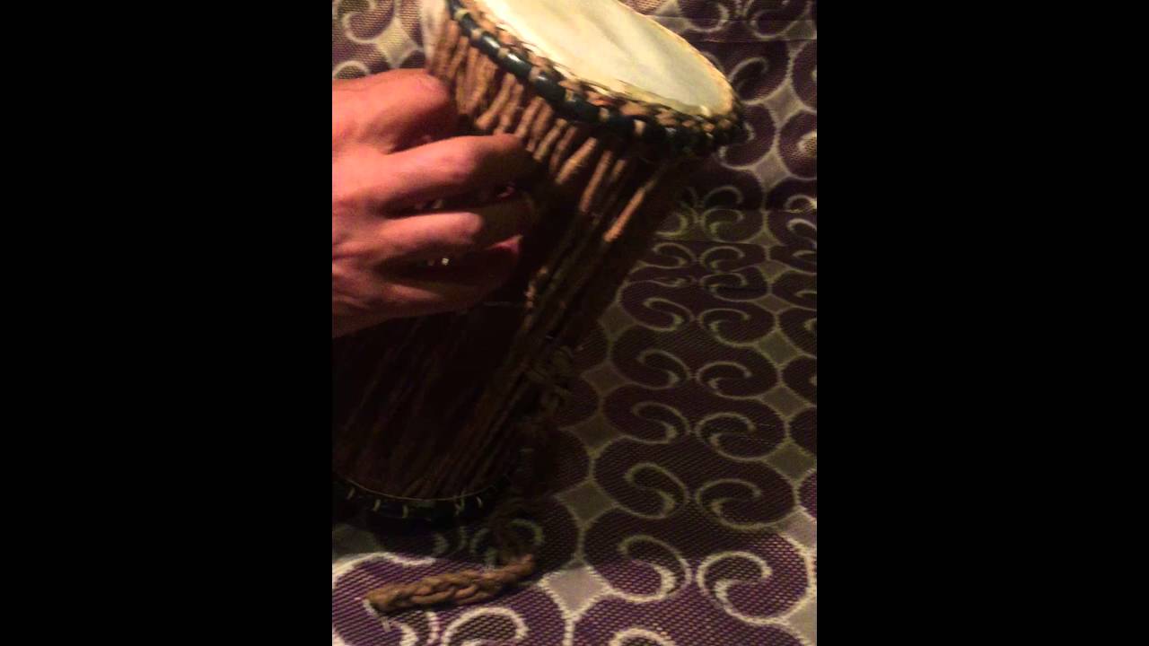 TALKING DRUM NIGERIA ADJUSTING A RUFFLED SKIN! YouTube