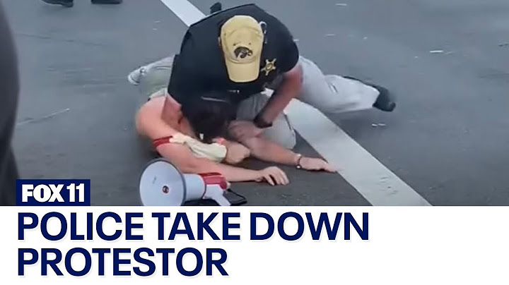 Police take down protestor approaching POTUS motorcade at Summit of the Americas