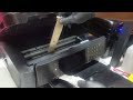 Cleaning plastic rollers on Epson WF-7710 with ribbon