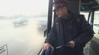 Police ride buses to ambush texting drivers