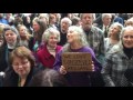 Activists break into song before Senator Elizabeth Warren's visit in Springfield