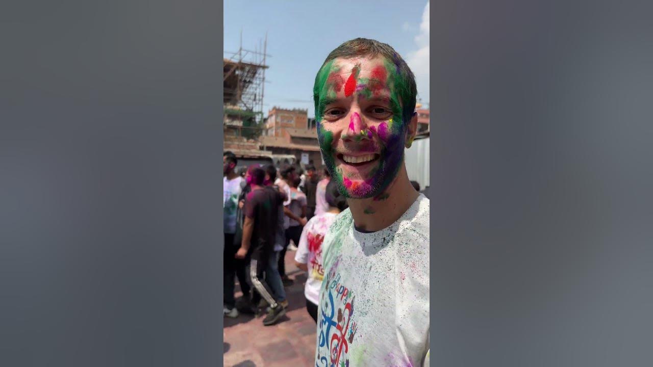 foreigners celebrating holi in india
