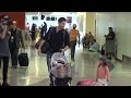 Adorable Family, Roselyn Sanchez, Eric Winter, And Daughter Pass Through LAX